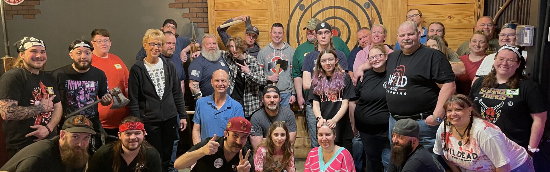 A group of guests together at Wild Axe Throwing